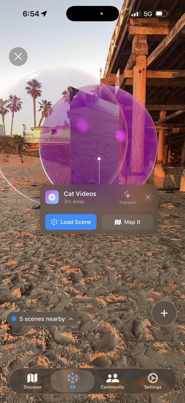 Screenshot of a translucent purple Ghost Scene sphere labeled Cat Videos, 3 meters away, with Load Scene and Map It buttons